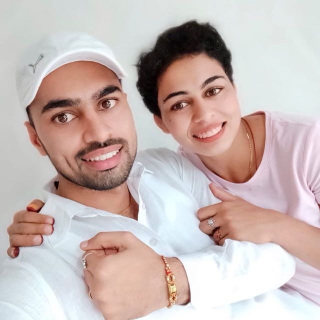 Pooja Dhanda with her brother