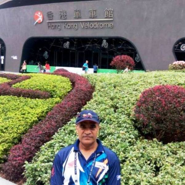 RK Sharma standing in front of the Hong-Kong Velodrome