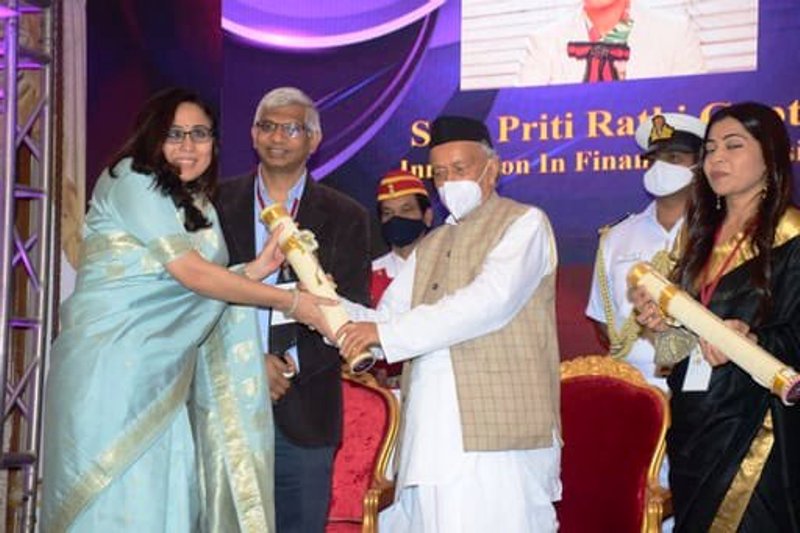 Radhika Gupta receiving her Impact Creator Award