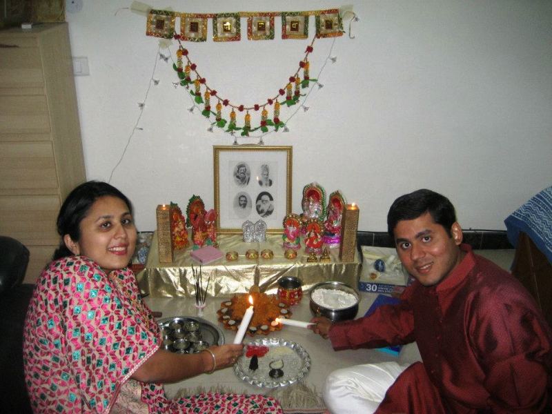 Radhika Gupta sitting in front of her temple at home during Diwali