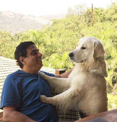 Ronnie Screwvala with his pet dog Skye