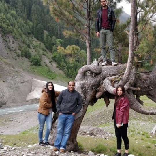 Saadia Khatib (in a brown jacket) with her father, sister and brother