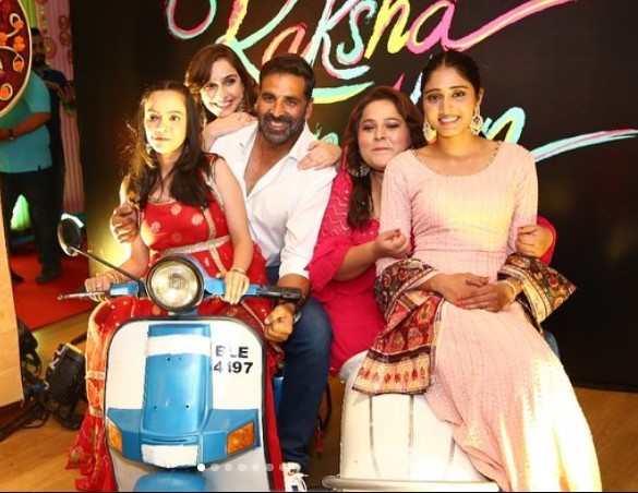 Smrithi Srikanth (in pink dress) with the cast of the film Raksha Bandhan