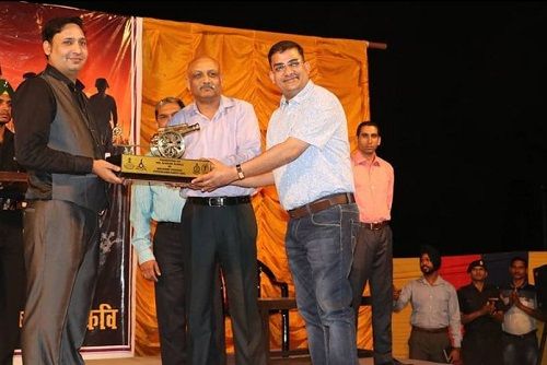 Suresh Albela being felicitated at an event