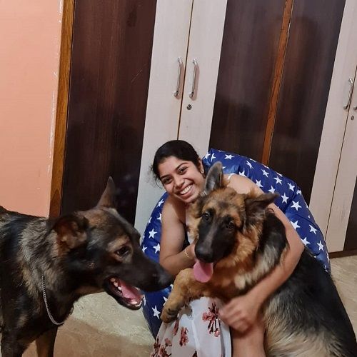 Aakarshi Kashyap with her pet dogs