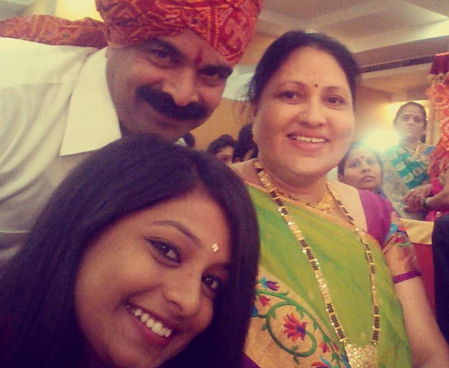 Amruta Pawar with her parents 