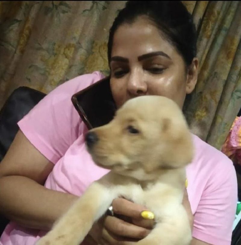 Arpita Mukherjee with a dog