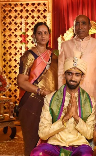 B. Sumeeth Reddy with his parents