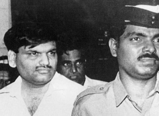 Harshad Mehta, arrested by the Central Bureau of Investigation in connection with the multicrore stock scam, being taken to the Esplande Court in Bombay in June 1992