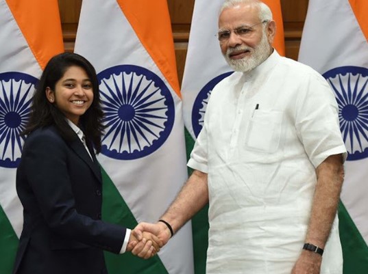 Indian Prime Minister Narendra Modi congratulates Mehuli Ghosh on the success of Commonwealth Games