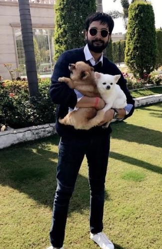 Prateek Garg with his pet dogs