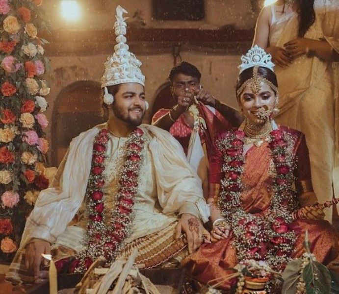 Rijuta Ghosh Deb with her husband performing their wedding rituals