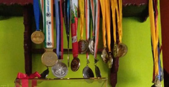 A picture of Medals won by Gururaj Poojary