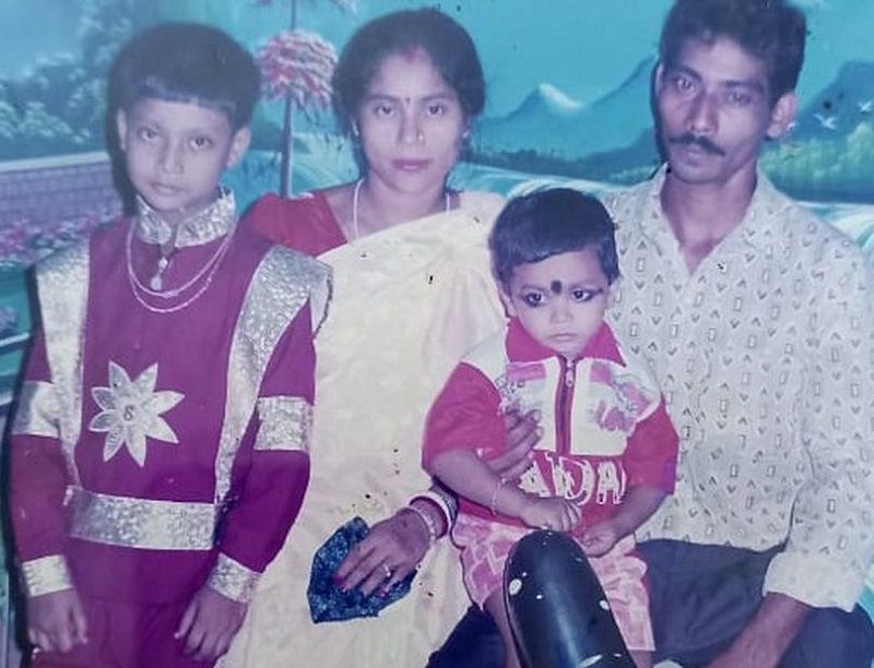 Achinta Sheuli as a child with his family