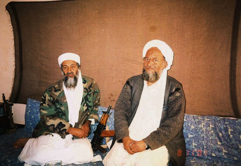 Ayman al-Zawahri sits with al Qaeda leader Osama bin Laden (L) during an interview in this in this 10 November 2001 image