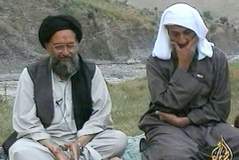 Ayman al-Zawahri sits with al Qaeda leader Osama bin Laden (R) somewhere in the mountains of Afghanistan
