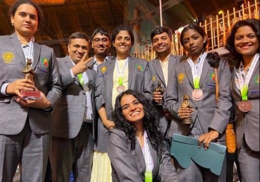 Bhakti Kulkarni (extreme right) after winning the bronze medal in a chess Olympiad in 2022