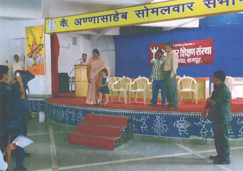 Divya Deshmukh receiving her first trophy at the age of five