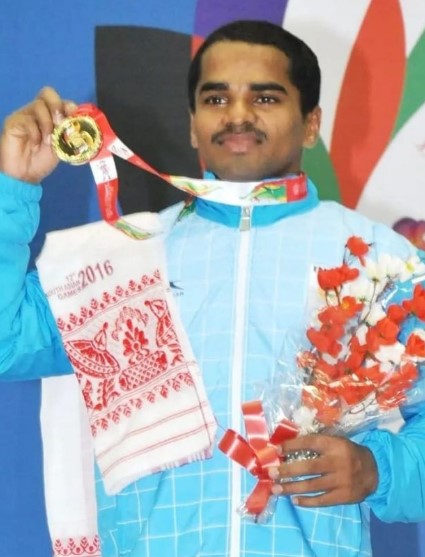Gururaj Poojary after winning a medal in 2016