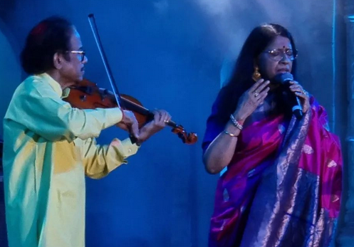 L Subramanium while performing a music show with his wife Kavita Krishnamurthy
