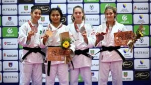 Linthoi Channambam poses with a gold medal at the World Cadet Judo Championships 2022 (second from left)