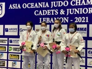 Linthoi Chanambam (right) poses with a bronze medal at the Asia Oceania Cadet and Junior Judo Championships 2021 in Beirut, Lebanon