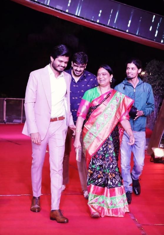 Madhavi Deverakonda with her son at an event