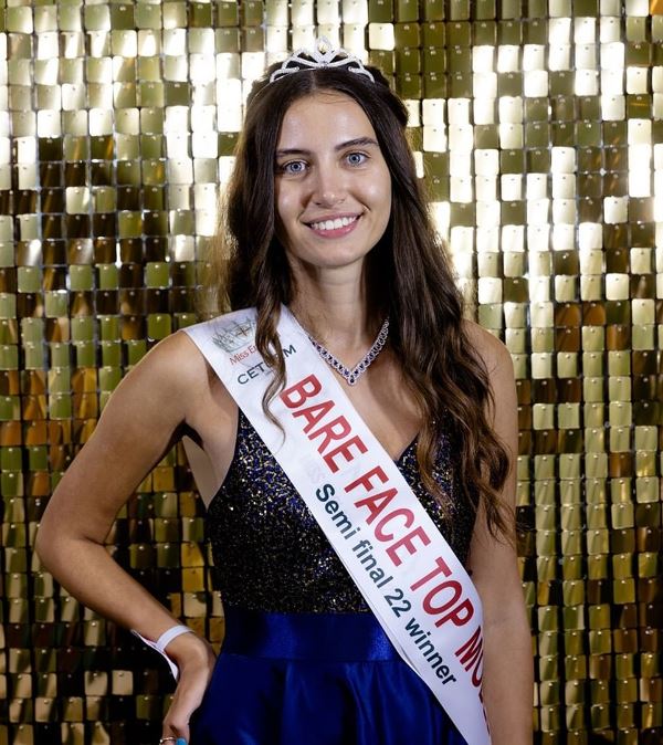 Melisa after winning the title of Bare Face Top Model at Miss England 2022