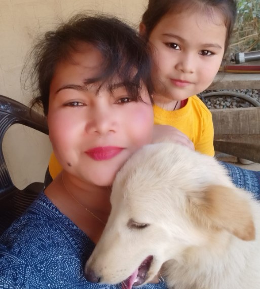 Nayanmoni Saikia with her pet god and daughter