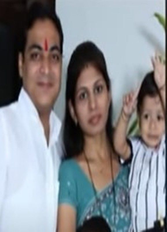 Raksha Khadse with her husband and son
