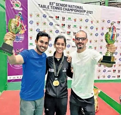 Sreeja Akula with her coach (left) after winning the 83rd Senior Table Tennis Championship