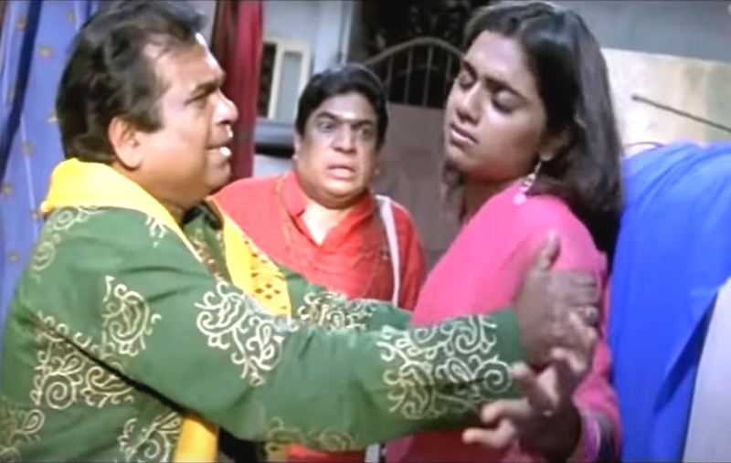 Abhinayashree (as Guru's wife) sharing the screen with Brahmanandam (as Guru) in the film Ek Niranjan (2009)
