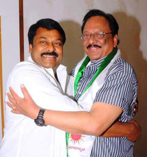 Krishnam Raju posing with PRP chief Chiranjeevi after joining the Praja Rajyam in Hyderabad in 2009