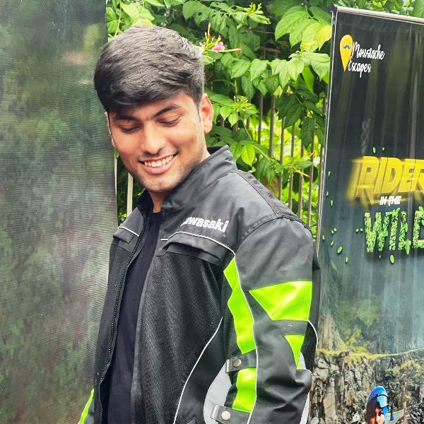 Abhiyuday Mishra posing for picture before beginning his biking escapade 'Riders in the Wild’ organised by Moustache Escapes in association with Madhya Pradesh Tourism Board
