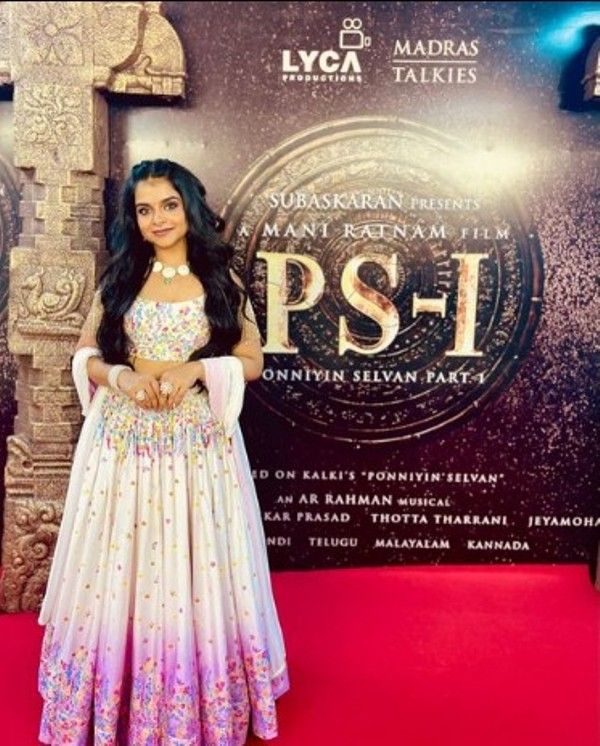 Antara Nandy with the poster of the Telegu film film Ponniyin Selvan - I (2022)