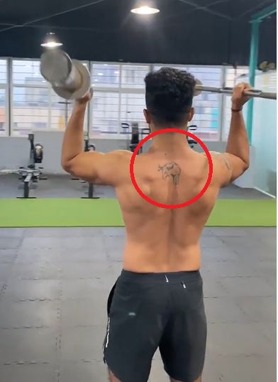 Arjun Hoysala's tattoo on his back