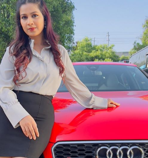 Inaya Sultana with her Audi car