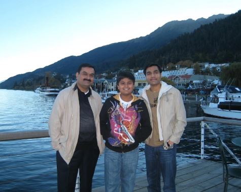 Karan Adani with his father and brother