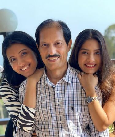 Krishna Mukherjee with her father and sister