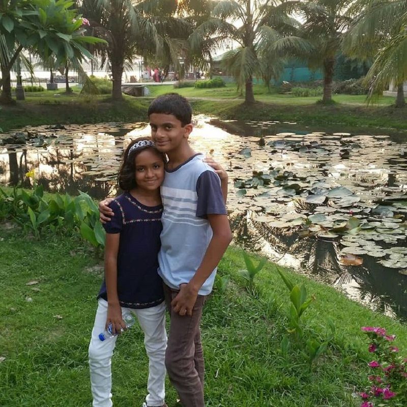 Nihal Sarin with his sister