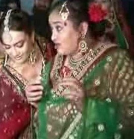 Nishi Singh (green suit) on the sets of the serial Qubool Hai in 2012