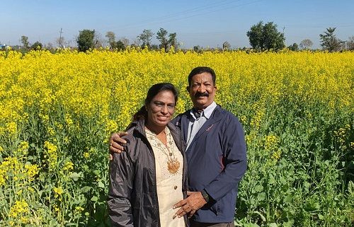 P. T. Usha with her husband