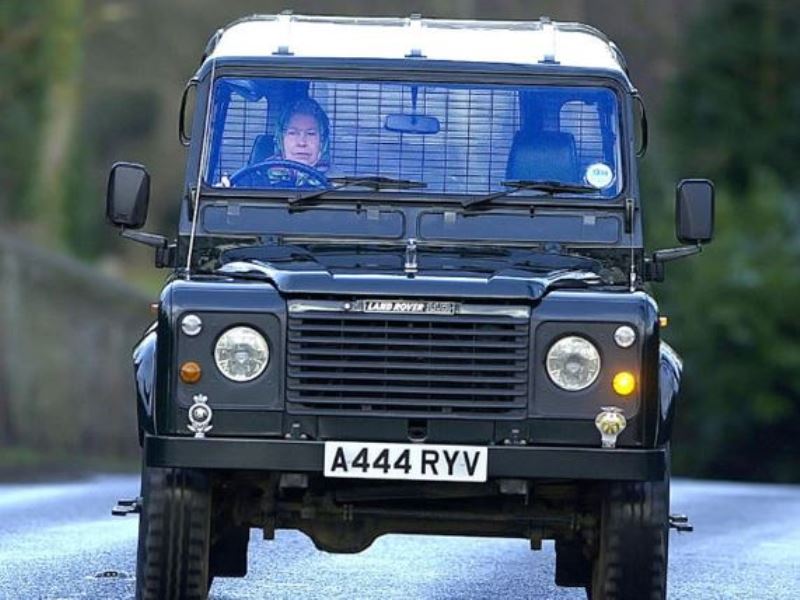 Queen Elizabeth II driving 2000 Land Rover Defender 110 