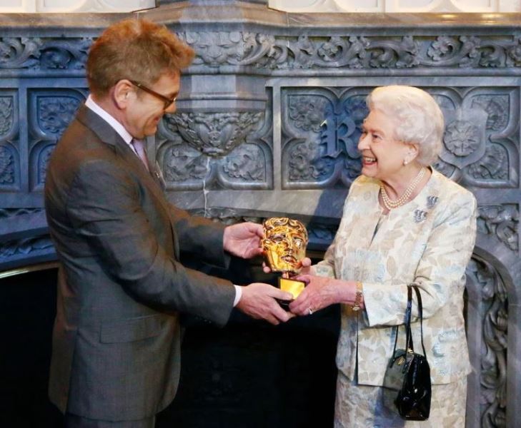 Queen Elizabeth receiving a BAFTA Award in 2013
