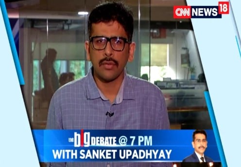 Sanket Upadhyay while hosting a show at News18's english channel CNN News18