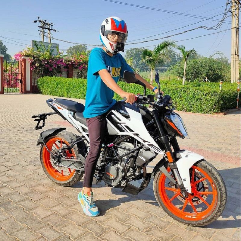 Sourav Joshi posing on his KTM bike