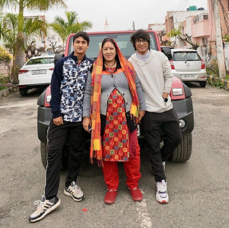 Sourav Joshi with his mother and brother