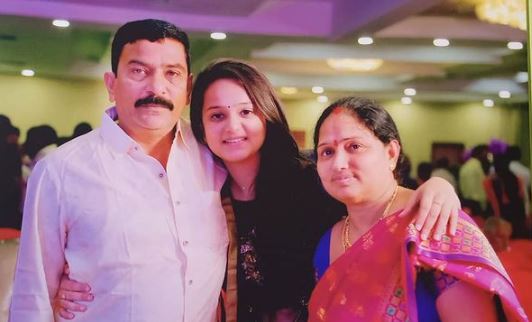Sri Satya with her parents