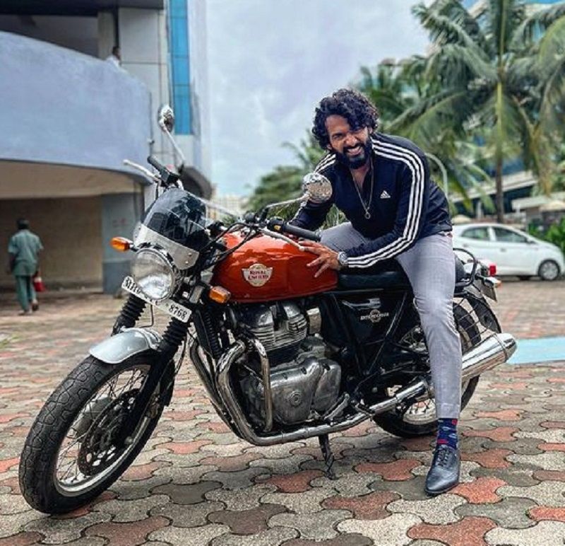 Vaibhav Raj Gupta posing on his bike