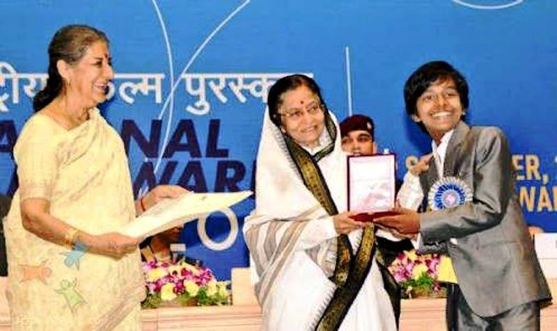  President Pratibha Patil presenting Best Child Artist Award to Harsh Mayar during the 58th National Film Awards Function' in New Delhi